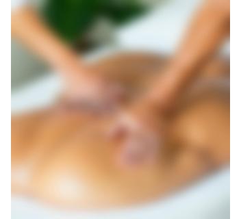Therapist performing deep tissue massage